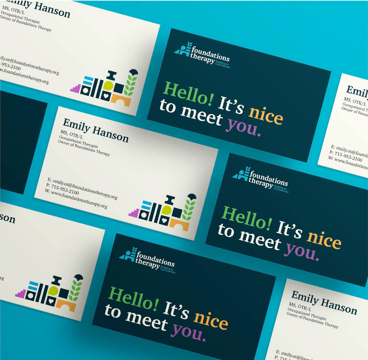 Top-down view of 9 business cards laying on a diagonal on a table, half are showing the back of the business card and the other half are showing the front of the business card, the back is dark blue with light text and the front is light yellow with dark text