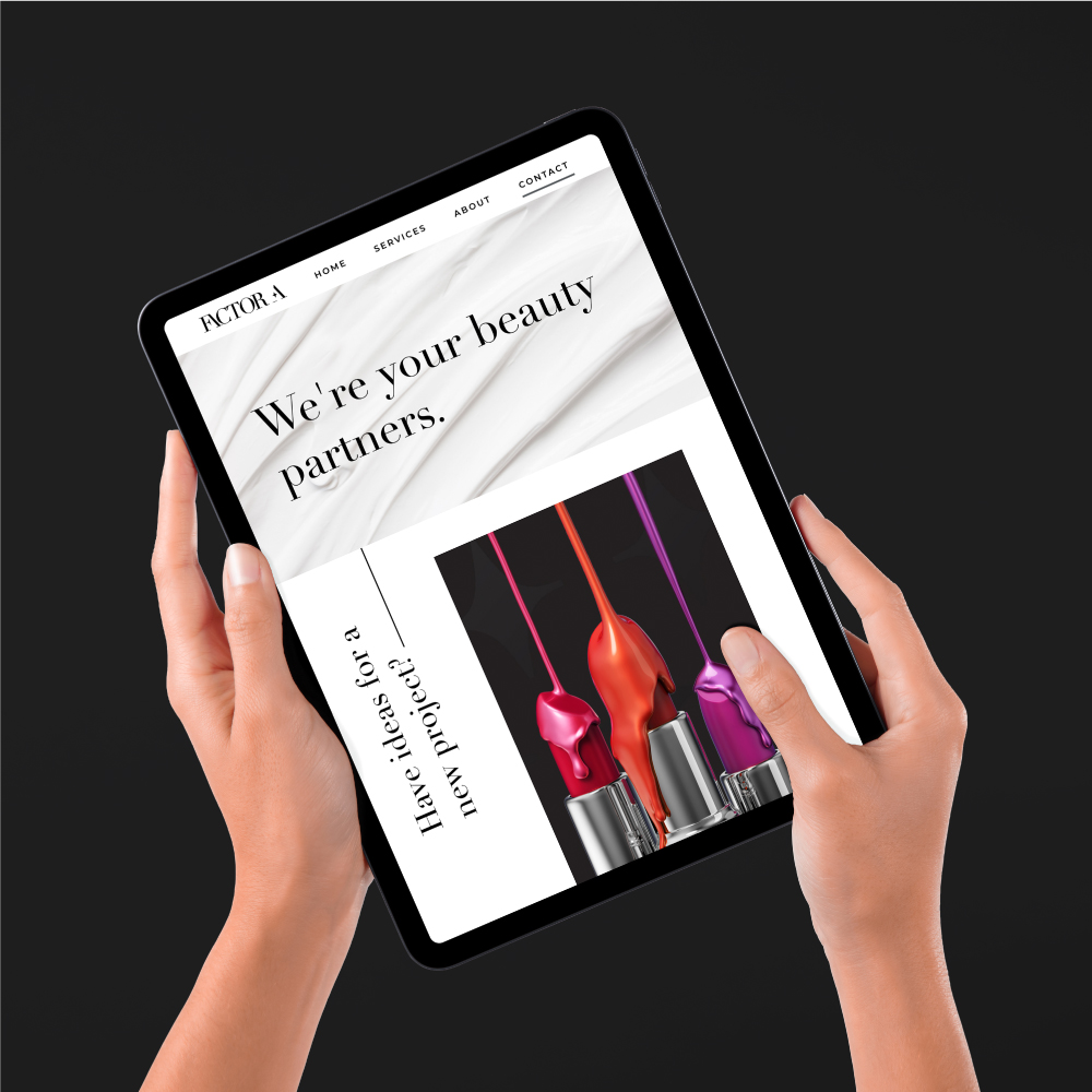 Hands holding a tablet, on the tablet is a website showing cosmetic products.