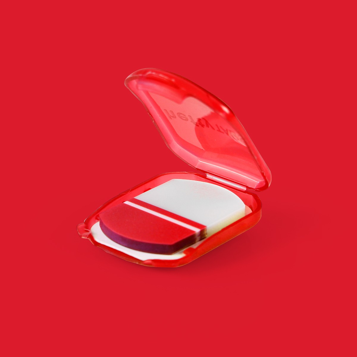 A small red container opened to reveal a stack of sticky tabs.