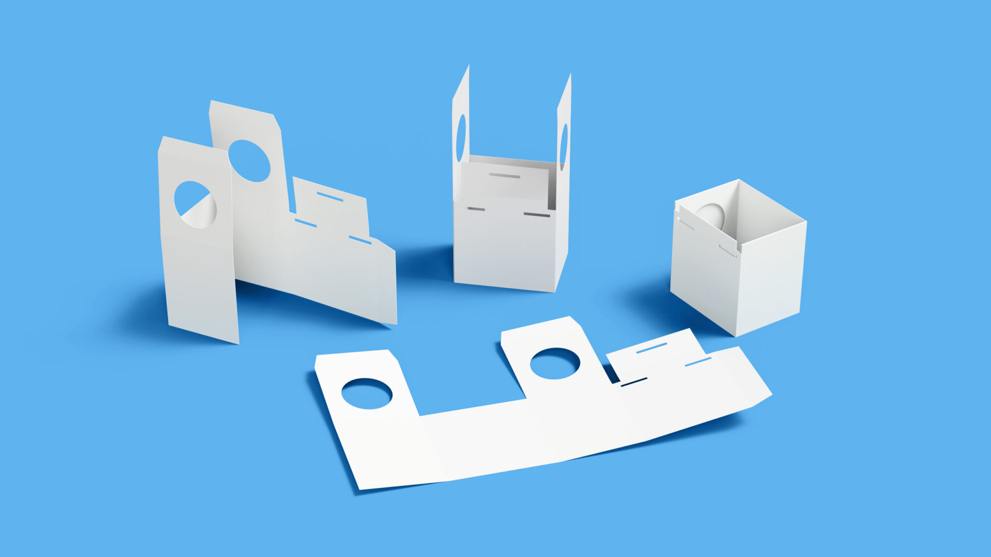 White paperboard packaging components laid out in different positions over a light blue background.